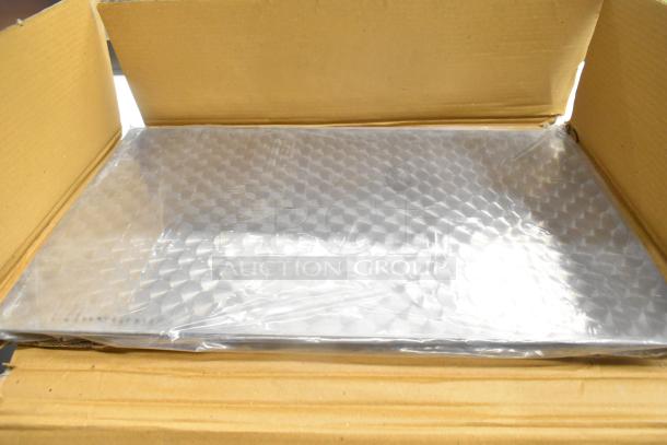 Box containing a Bon Chef 52109 EX Fit Tile Pattern Tabletop, packaged in bubble wrap, showcasing new condition.