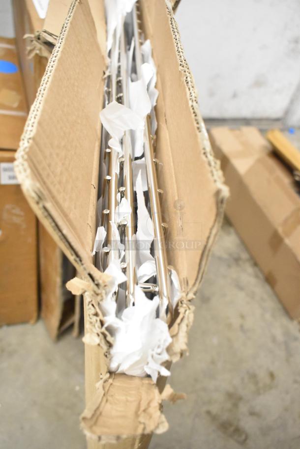 Box containing brand new Bon Chef 52109 EX fit tile pattern tabletop and metal oven racks, showing packaging and contents.