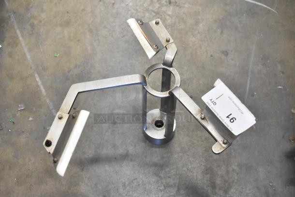 Metal auger with three curved blades, central cylindrical attachment, in used condition. Auction tag marked "91."