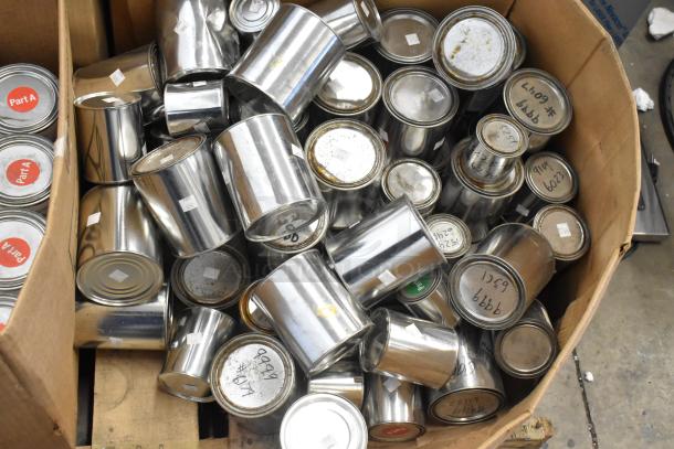 150 various cans of Pro Guard chemicals, including ProFlex 1501 Part A and B epoxy, in an industrial container.
