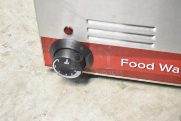 Brand new, scratch and dent Avantco 177W50 12"x20" electric countertop food warmer, 120V, 1 phase, control knob visible.