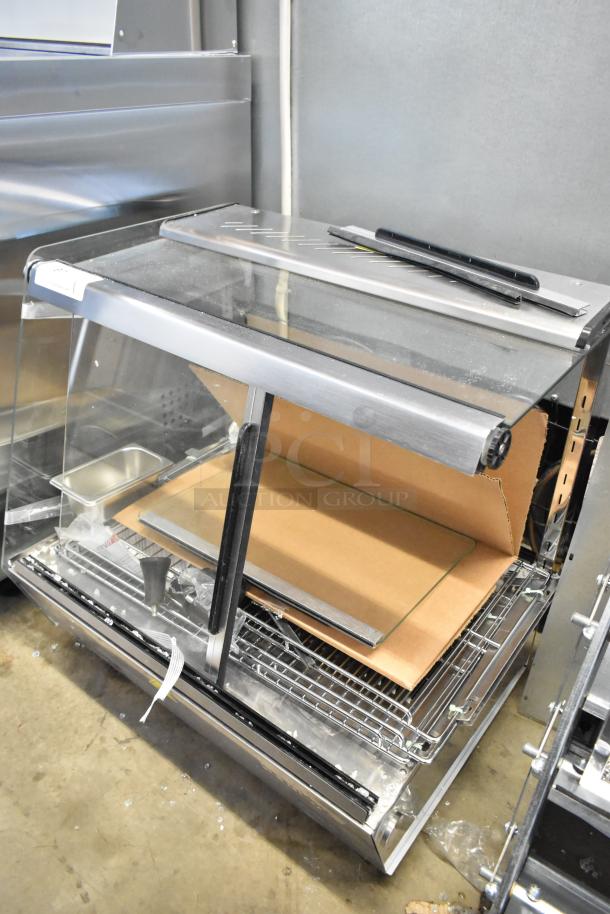ServIt 423HDM26SA 26" heated display case, brand new, 3 shelves, sliding doors, visible glass damage. 120V, 1 Phase.