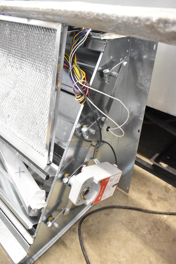 Brand new Daikin Hood with McDaniels Metal 122-DK-090, features exposed wiring and components, slight scratches.