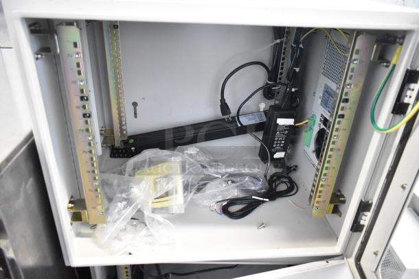 White BlackShields DC0300 metal air-conditioned cabinet, well-maintained, includes wiring, accessories, and internal components visible.