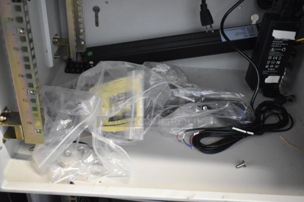 2 BlackShields DC0300 white metal cabinets, air-conditioned, wires and components included, in new condition.