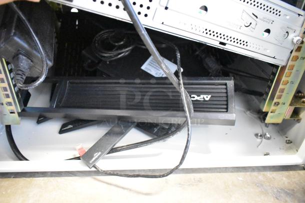 BlackShields DC0300 White Metal Air Conditioned Cabinet, showing interior components and cabling.