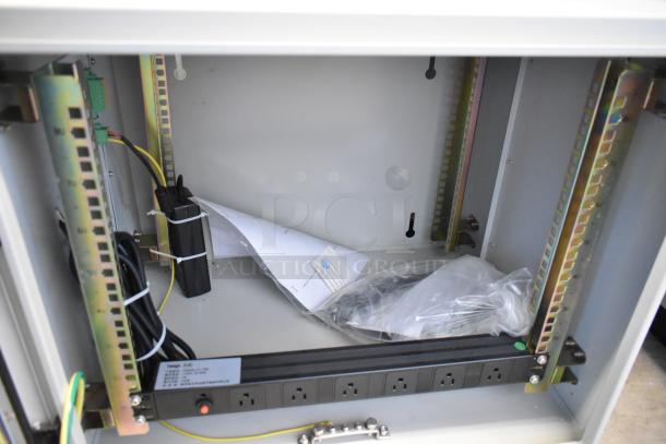 BlackShields DC0300 white metal air-conditioned technology cabinet. Includes internal wiring and power strip; excellent condition.