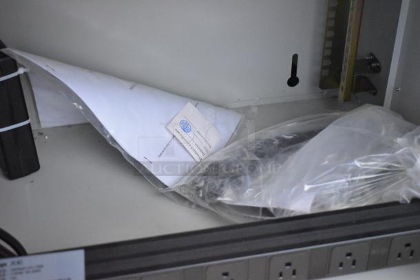 BlackShields DC0300 White Metal Air Conditioned Technology Cabinet, includes documentation and product certificate.