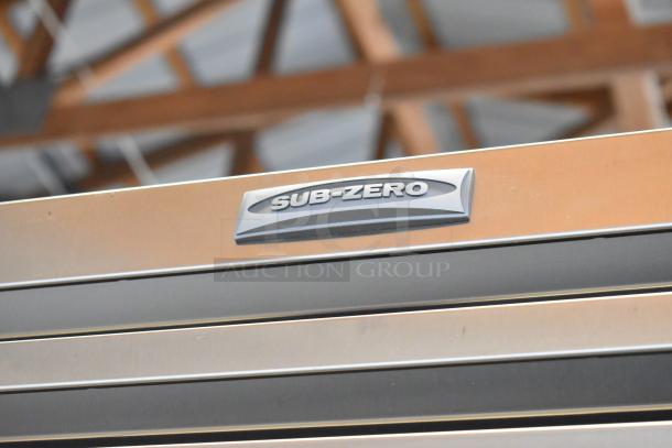 Sub-Zero Reach In Cooler and Freezer, stainless steel, Sub-Zero logo visible, excellent condition, durable design.