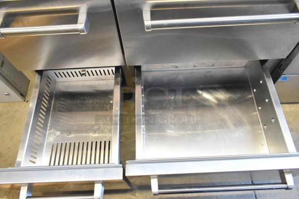 Sub-Zero Reach-In Cooler with Freezer, stainless steel drawers open, showing clean and spacious interior.
