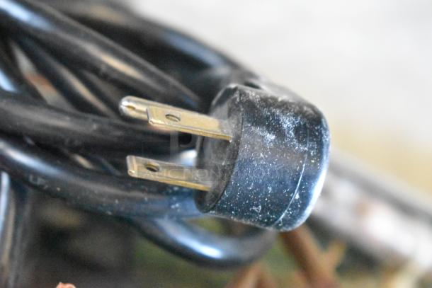 Delfield 406CA-DD1 undercounter cooler plug detail, showing standard 115V connection.