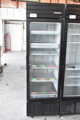 2019 Habco SE18 commercial reach-in cooler with single glass door, poly-coated racks, 115 volts, 1 phase, excellent condition.