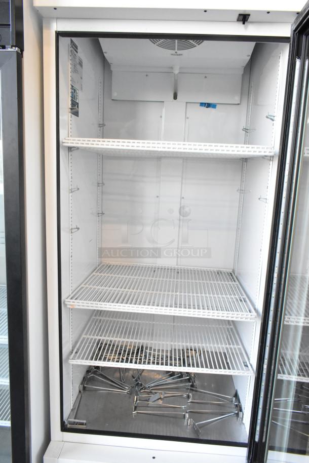 2021 True TSCI-600R-G-PH commercial cooler, single door, poly-coated racks, 115V, excellent condition.