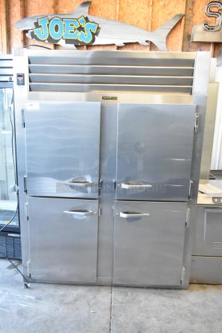 Traulsen RHT232WUT-HHS Commercial Reach-In Cooler, 4 half-size doors, stainless steel, 115V, 1 phase, good condition.