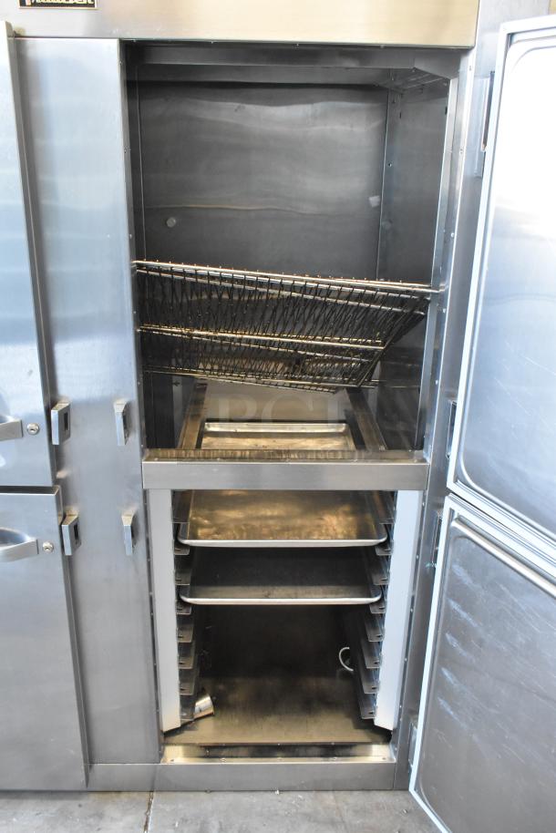 Traulsen RHT232WUT-HHS commercial cooler with 4 half-size doors, stainless steel, showing interior shelves and racks.