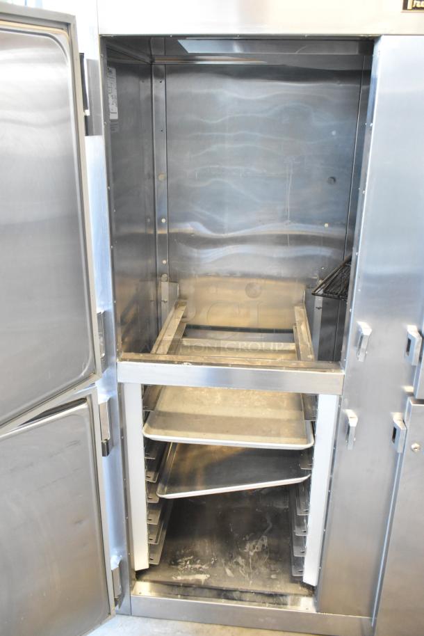 Traulsen RHT232WUT-HHS commercial reach-in cooler with four half-size doors, 115V, 1 phase, showing interior shelving.