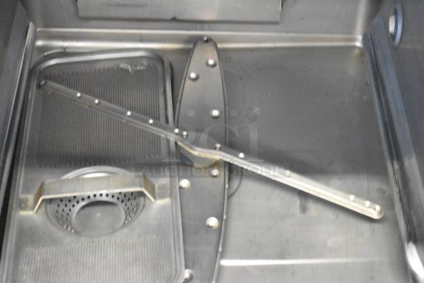 2018 Hobart LXER stainless steel interior of commercial undercounter dishwasher, model shows cleaning and spray arm.