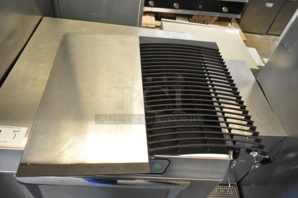 Manitowoc SD0602A commercial ice head on bin. Stainless steel finish, 208-230V, 1 phase. Used, good condition.