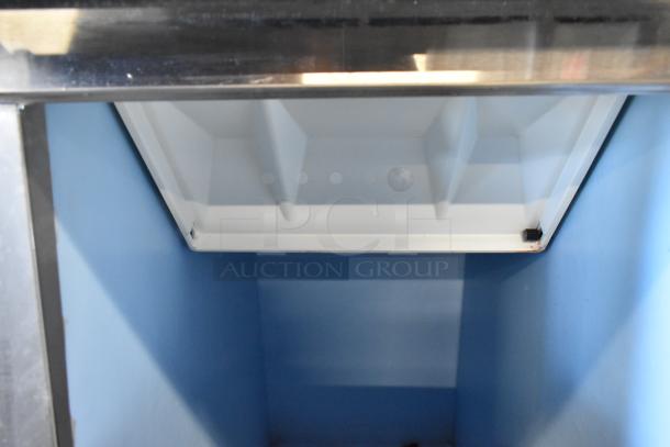 Hoshizaki KM-350MAJ ice head on B-300PF bin, 115V, 1 phase, commercial-grade, shown in clean interior condition.