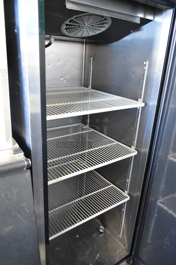 Turbo Air M3F24-1 commercial freezer, single door, poly coated racks, 115 volts, 1 phase, excellent condition.