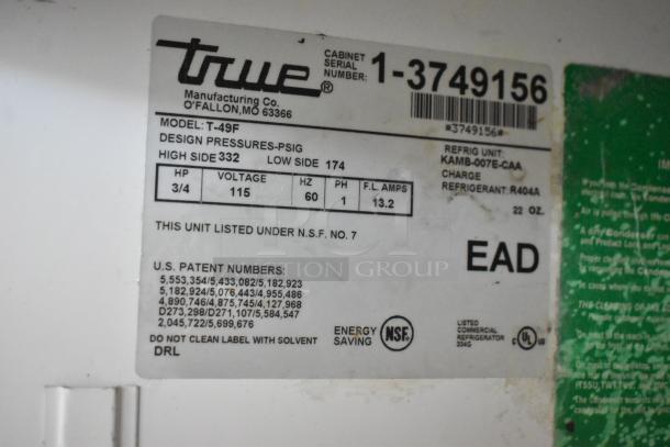 True T-49F commercial freezer label, showing specs: 115 volts, 1 phase, R404A refrigerant, NSF certified. Serial: 1-3749156.