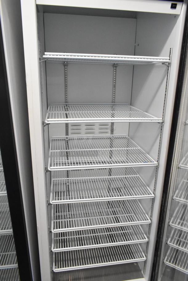 2019 Habco SE18 commercial single door reach-in cooler, poly coated racks, 115 volts, 1 phase, excellent condition.