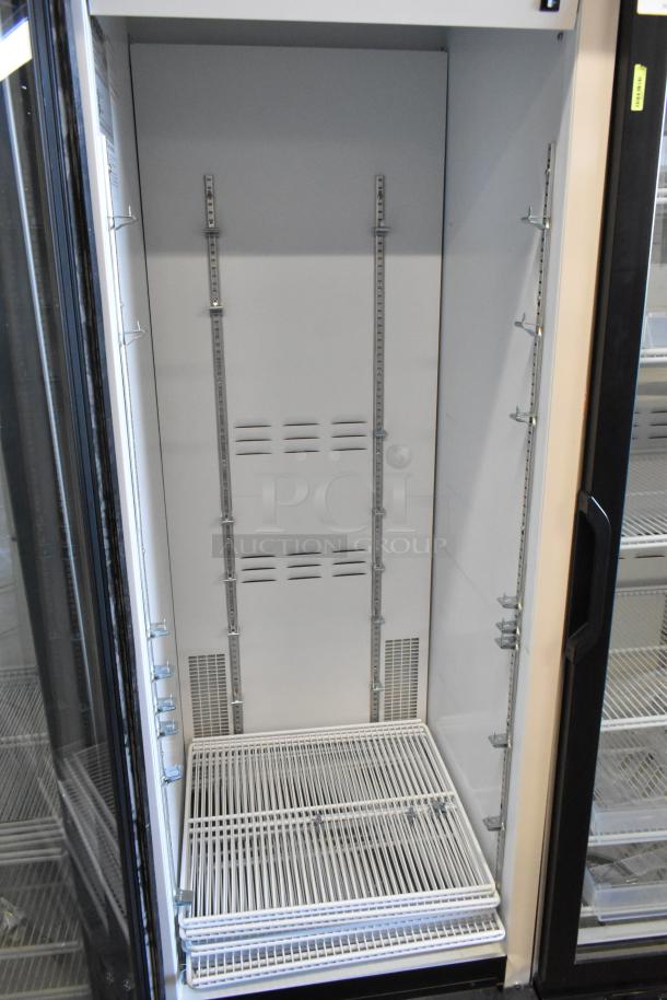 2019 Habco SE18 commercial single door reach-in cooler merchandiser with poly-coated racks, 115 volts, 1 phase.