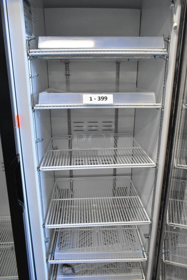 2019 Habco SE18 commercial reach-in cooler with single glass door, poly-coated racks, 115 volts, excellent condition.