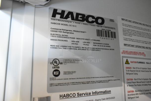 2019 Habco SE18HC commercial reach-in cooler, single door, poly coated racks, 115V, UL & NSF listed, model details label.