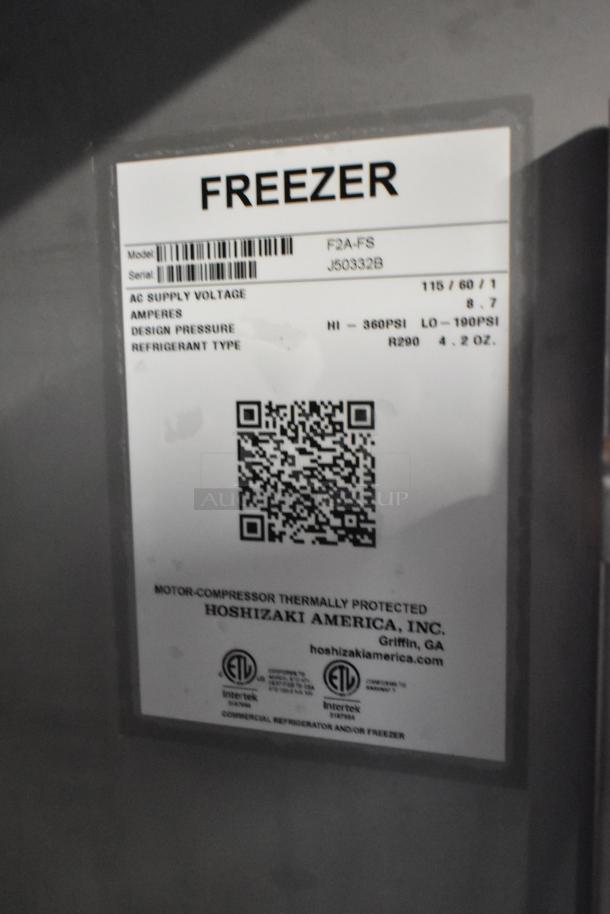 Label from 2019 Hoshizaki F2A-FS Commercial 2 Door Reach In Freezer, showing model, serial number, voltage, and specifications.