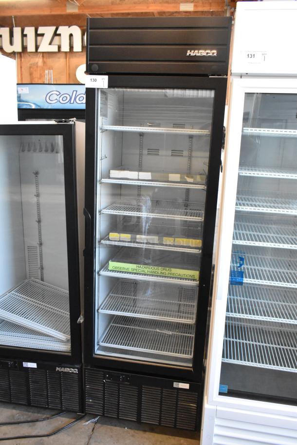 2019 Habco SE18 commercial single door reach-in cooler with poly-coated racks; 115 volts, 1 phase, excellent condition.