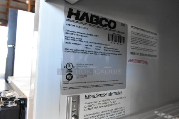 2019 Habco SE18 commercial single door cooler with poly-coated racks, 115 volts, 1 phase. Labels show model, UL, NSF listed.