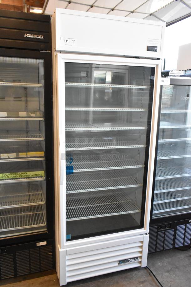 2021 True TSCI-600R-G-PH commercial single door cooler with glass front and poly coated racks, 115 volts, excellent condition.