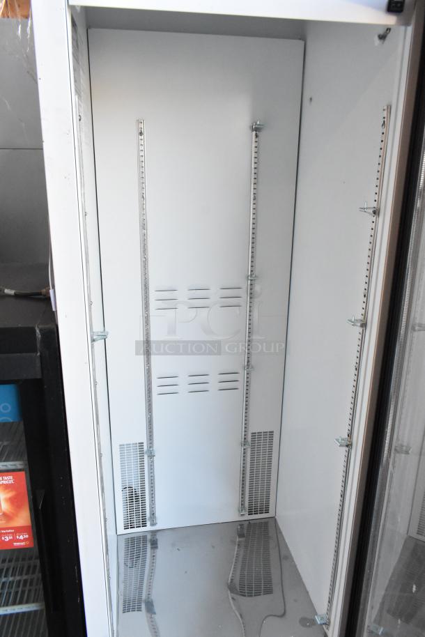 2019 Habco SE18HC commercial single door cooler, 115V, excellent condition, interior view showing shelving tracks.