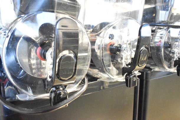 Sencotel Freazy 2 commercial slushie machine, brand new with minor scratches, dual hoppers, 115V, 1 phase.