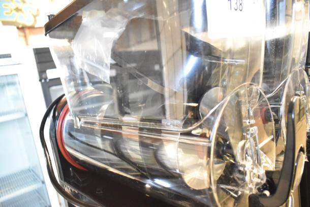 Brand new Sencotel Freazy 2 countertop slushie machine, dual hoppers, 115V, minor scratches, ideal for commercial use.