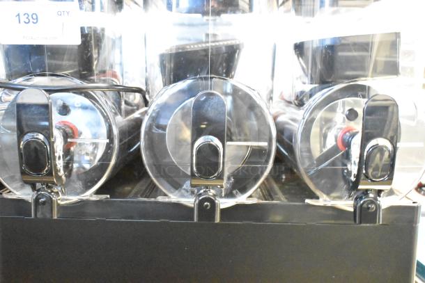 Brand new Sencotel Freazy 3 slushie machine, 3 hoppers, 115 volts, 1 phase, with scratch and dent details visible.