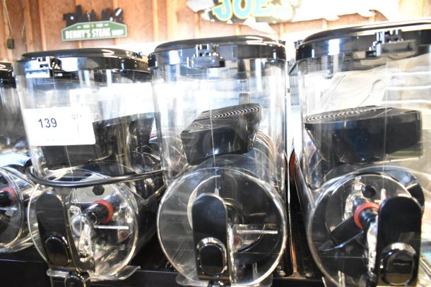 BRAND NEW Sencotel Freazy 3 commercial slushie machine, 3 hoppers, 115V, 1 phase, scratch and dent condition.