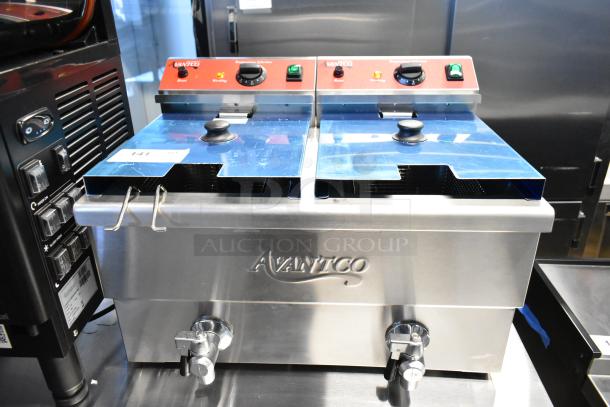 Brand new Avantco 177F202 dual tank electric fryer, 30 lb capacity, with two lids and baskets. Scratch and dent condition.