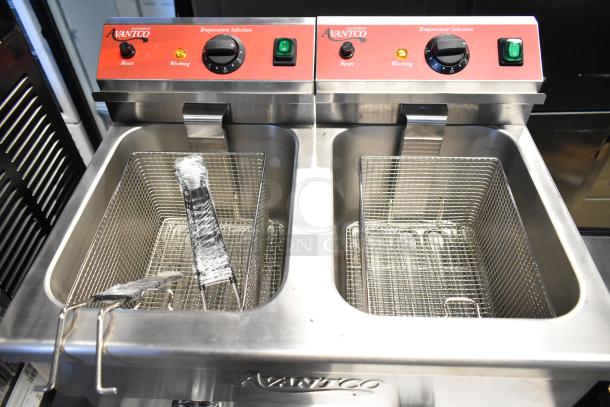 Brand new Avantco 177F202 30 lb. dual tank electric fryer, 208-240V, with 2 lids and baskets. Scratch and dent condition.