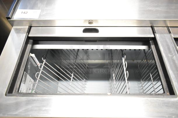 Brand new 2025 True TD-80-30-HC black horizontal bottle cooler, 3 sliding lids, interior view, 115V, 1 phase, minor scratches.