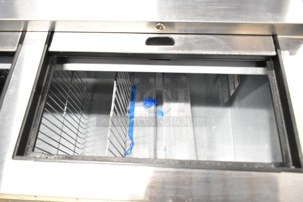 BRAND NEW 2025 True TD-80-30-HC Commercial Black Horizontal Bottle Cooler with 3 Sliding Lids, 115V, 1 Phase. Visible interior.