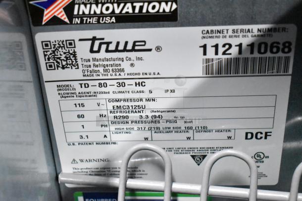 Label of True TD-80-30-HC commercial cooler, showing model info, 115V specs, R290 refrigerant details, and serial number.