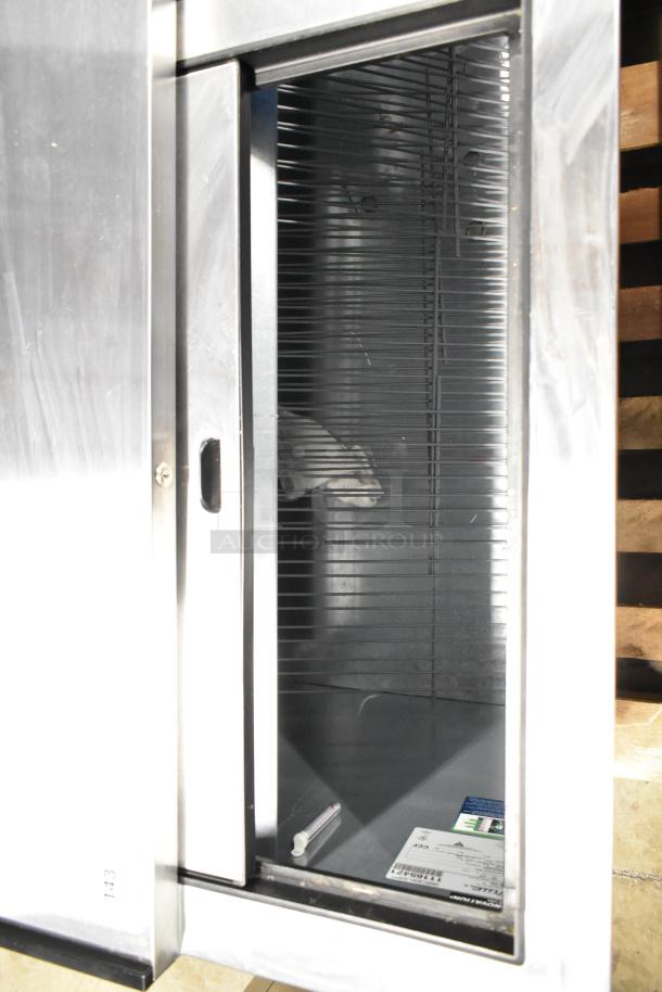 Brand new 2025 True TD-95-38-HC black commercial bottle cooler, scratch and dent, with 3 sliding lids, 115V, 1 phase.