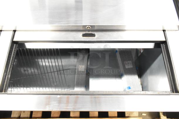 Brand new True TD-95-38-HC commercial bottle cooler with 3 sliding lids, visible interior label, 115 Volts, 1 Phase.