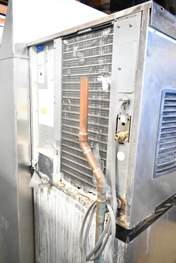 Scotsman C0322SA-1B commercial ice machine head on bin, 115V, 1 phase, visible wear on exterior, key features intact.