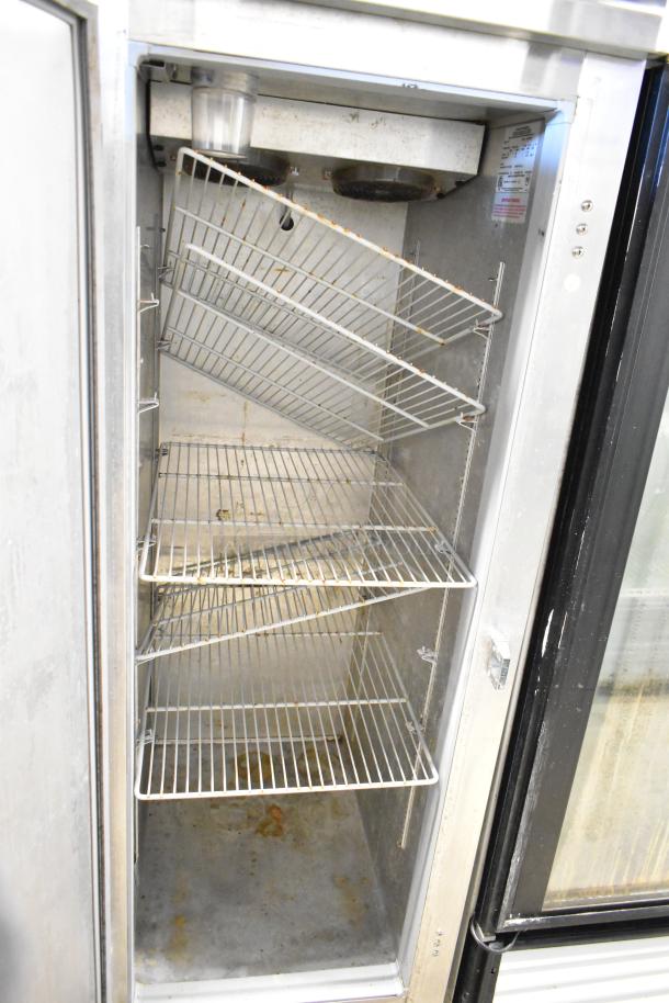 Continental 1R single door reach-in cooler with poly-coated racks, interior view. Shows wear. 115 Volts, 1 Phase.