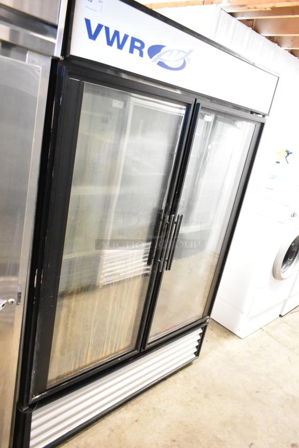 True GDM-49 commercial cooler, two glass doors, poly-coated racks, VWR branding, 115V, 1 Phase, fair condition.