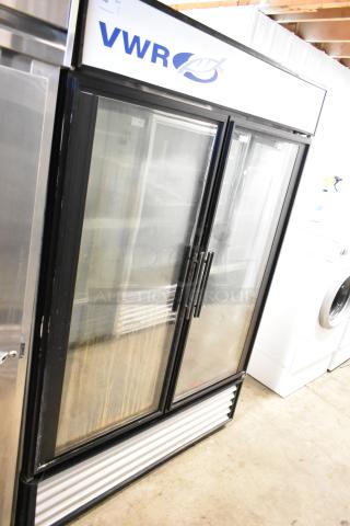 True GDM-49 commercial cooler, two glass doors, poly-coated racks, VWR branding, 115V, 1 Phase, fair condition.