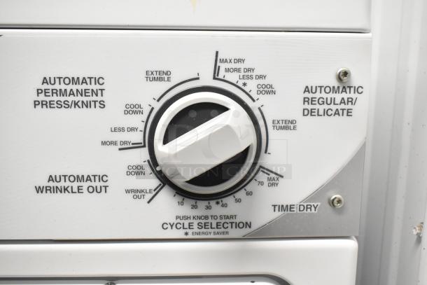 Knob for cycle selection on Speed Queen Alliance AFN50FSP111TW01 front load washer, showing timer and settings.